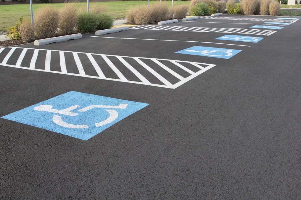 ADA compliant parking space markings on blacktop