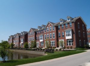 brick townhomes and condominium managed by an accredited residential manager