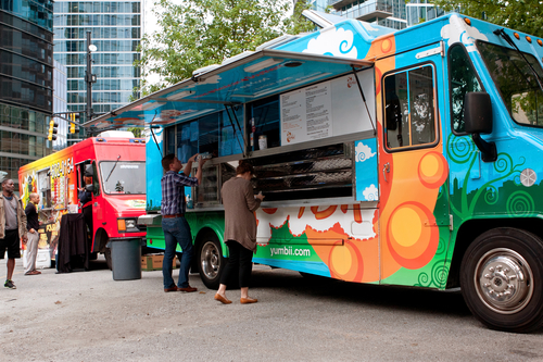 Apartment Residents Odering Food From Food Truck Rally During An Apartment Resident Event