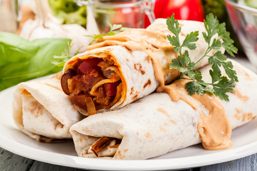 Three Burritos on Platter For Top Apartment Resident Events Ideas For April Blog
