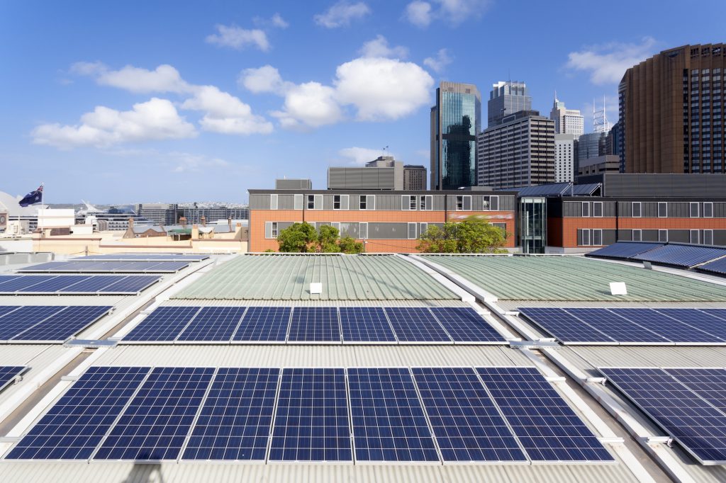 Commercial Solar Panels On Flat TPO Roof Improve Building Energy Efficiency