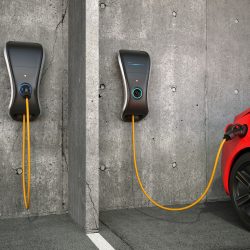 EV Charging Station Mounted To Parking Garage Wall Charging Car
