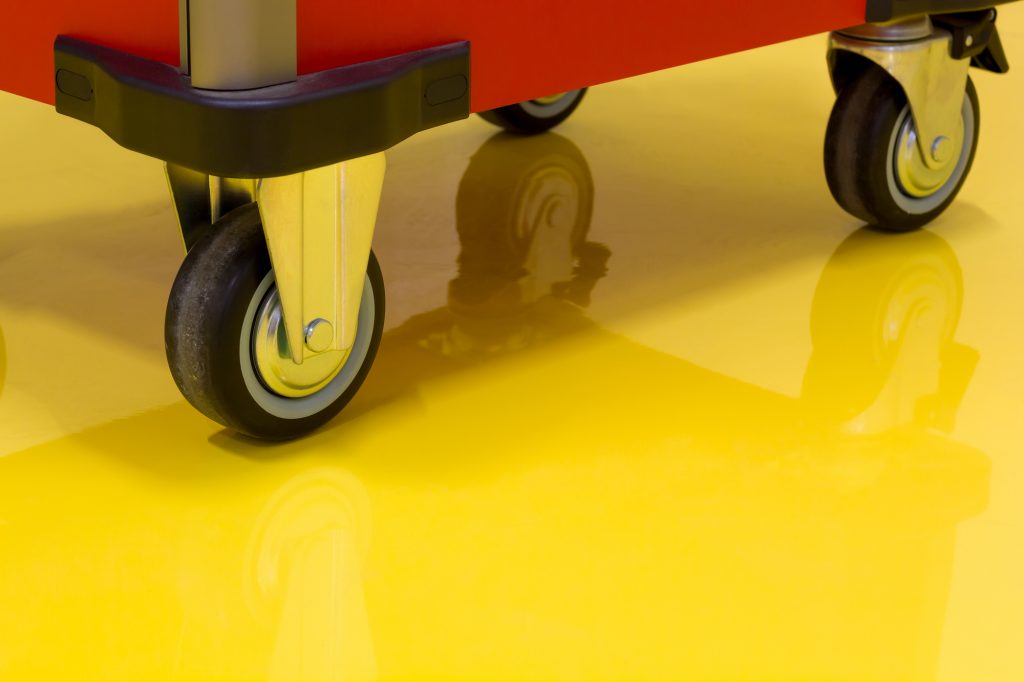 Roller Cart on Yellow Epoxy Floor for Commercial Floor Coating Blog