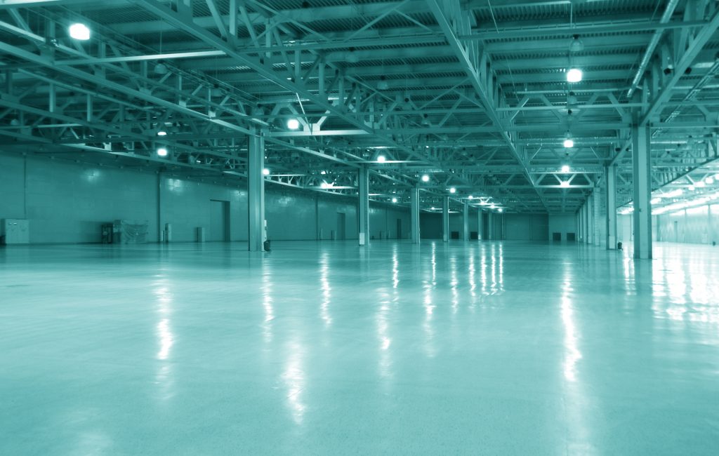 Warehouse with Epoxy Floor Coating For Benefits of Commercial Floor Coatings for Property Managers Blog