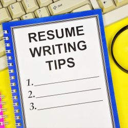 Note Pad Over Computer Keypad With Pen For Writing Down Property Management Resume Tips