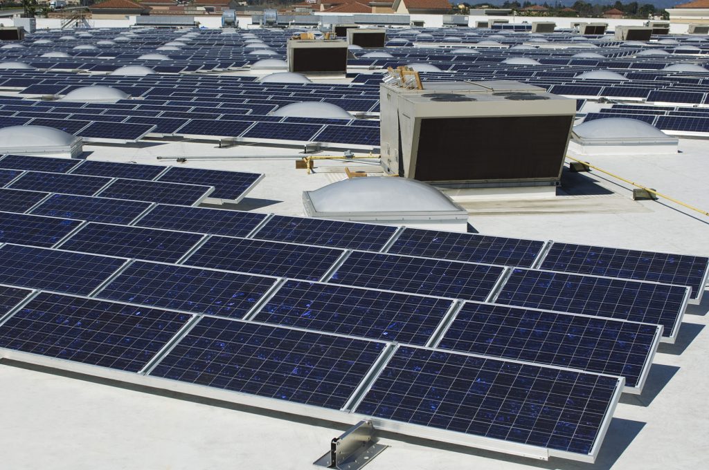 Go Green At Commercial Properties With Flat TPO Rooftop Solar Panel Installations