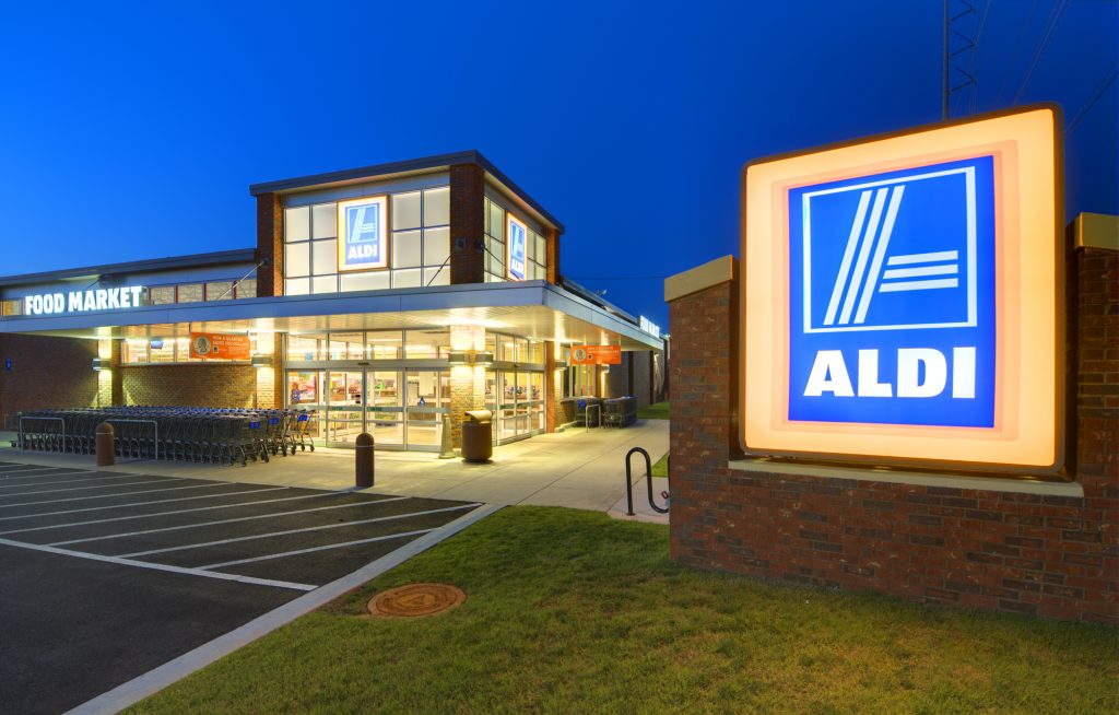 Aldi Grocery Store Sign At Night In Neighborhood Shopping Center 