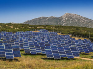 Commercial Solar Panel Array In A Field Generating Solar Energy For Properties And Buildings