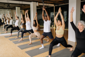 Apartment Residents During Yoga Class During A June 2022 Apartment Resident Event For International Yoga Day